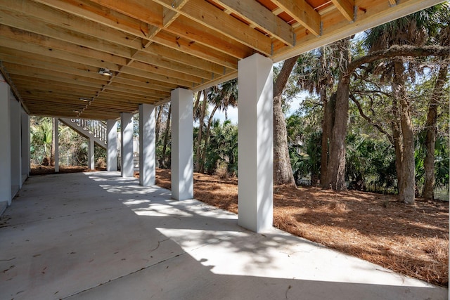 view of patio featuring stairway