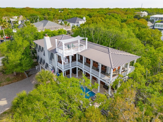 bird's eye view featuring a view of trees