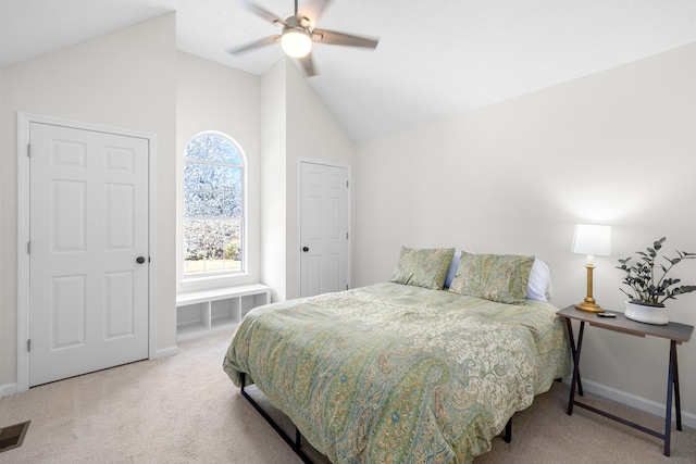 bedroom featuring carpet floors, baseboards, visible vents, and ceiling fan