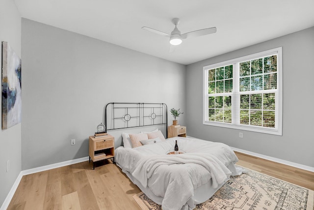 60 Fenwick Hall Aly Unit 415, Johns Island, SC 29455 - bedroom featuring light wood-style flooring, baseboards, and ceiling fan