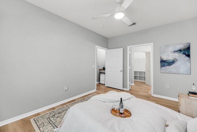 60 Fenwick Hall Aly Unit 415, Johns Island, SC 29455 - bedroom with light wood-type flooring, baseboards, a ceiling fan, and a spacious closet