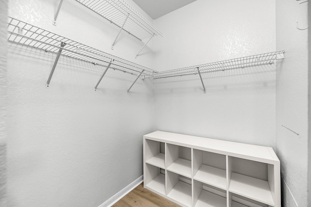 60 Fenwick Hall Aly Unit 415, Johns Island, SC 29455 - spacious closet featuring wood finished floors