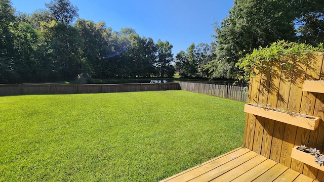 view of yard with a deck