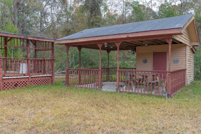 exterior space with a gazebo and a wooden deck