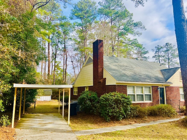 view of home's exterior with a carport