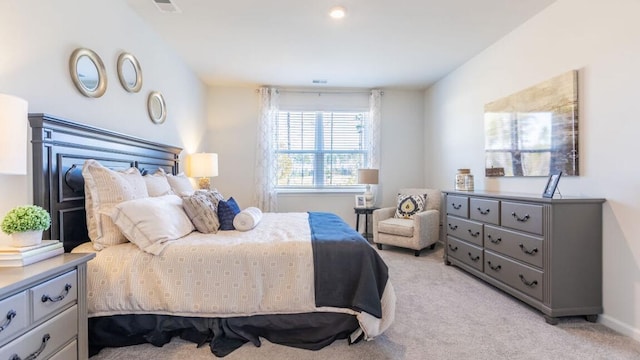 bedroom with light carpet