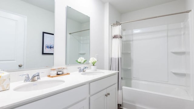 bathroom with vanity and shower / bath combo