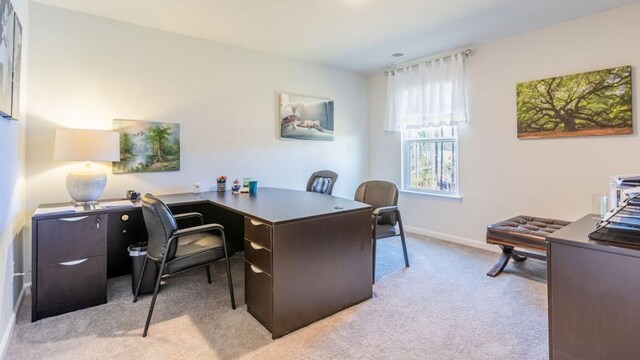 home office featuring light colored carpet