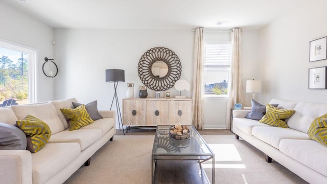 living room featuring light colored carpet