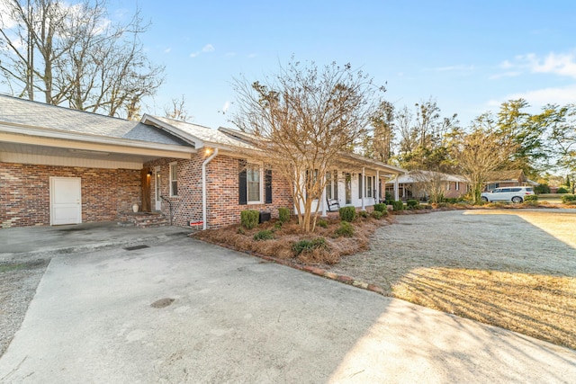 exterior space featuring a carport