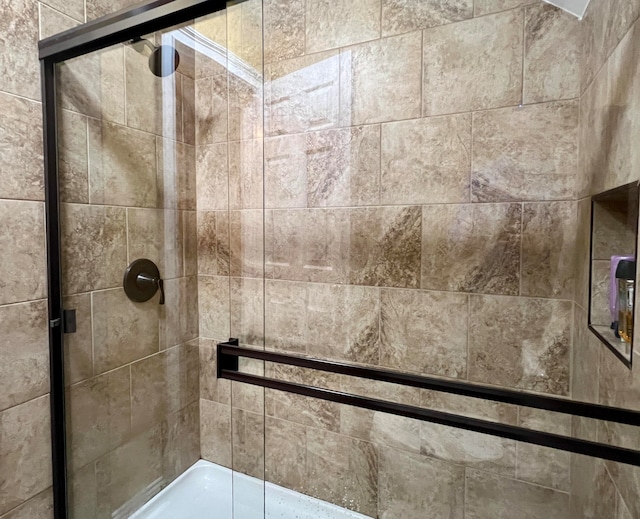 bathroom featuring walk in shower