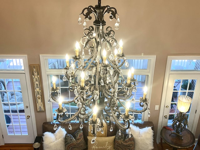 dining space with a chandelier and a towering ceiling