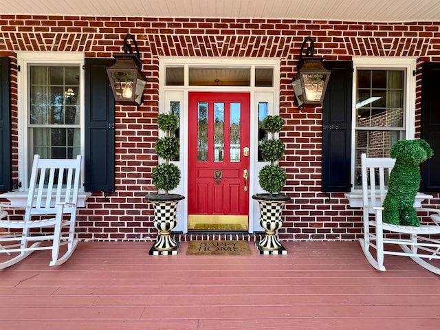 property entrance featuring covered porch