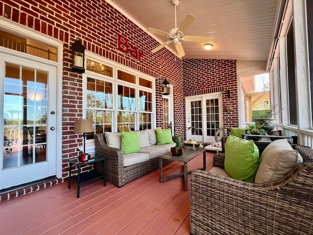 exterior space with lofted ceiling, wooden ceiling, and ceiling fan