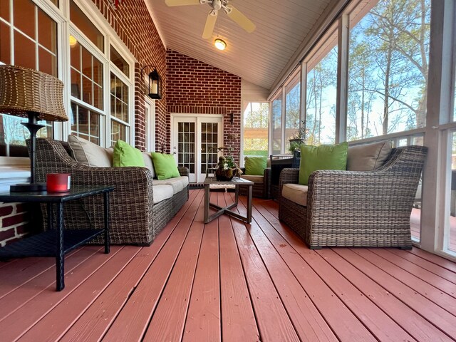 exterior space featuring an outdoor hangout area and ceiling fan