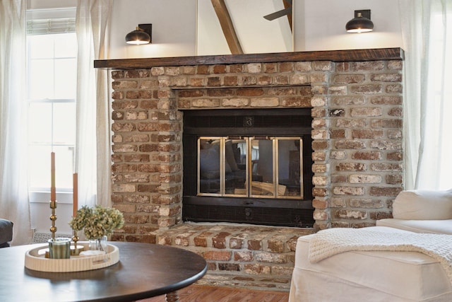 room details featuring a brick fireplace