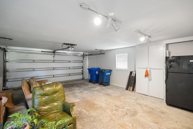 garage featuring freestanding refrigerator