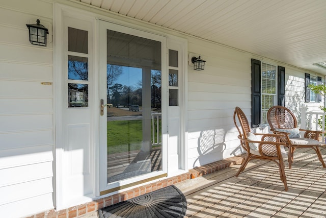 doorway to property with a porch