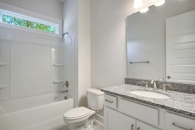 full bathroom featuring  shower combination, vanity, and toilet