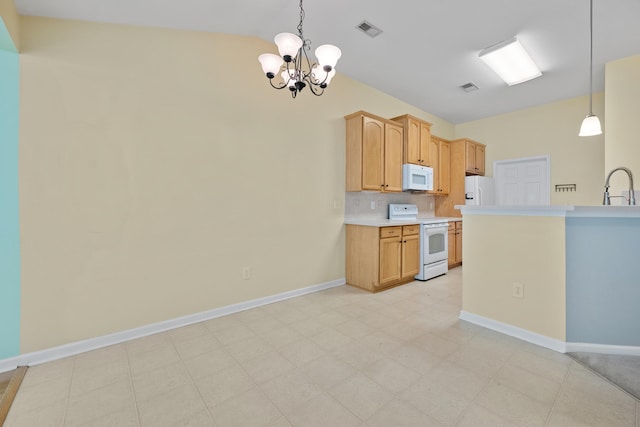 261 Sweet Alyssum Dr, Ladson, SC 29456 - kitchen with white appliances, a sink, a chandelier, tasteful backsplash, and light countertops