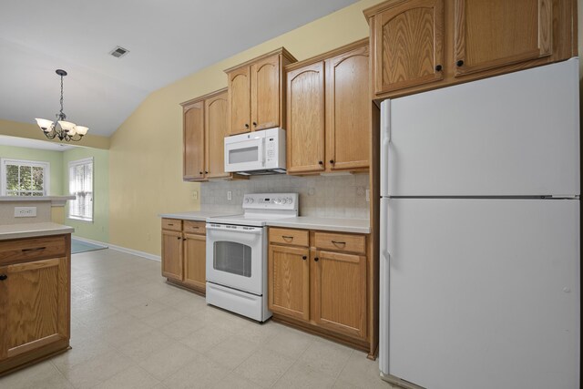261 Sweet Alyssum Dr, Ladson, SC 29456 - kitchen with white appliances, lofted ceiling, light floors, light countertops, and tasteful backsplash