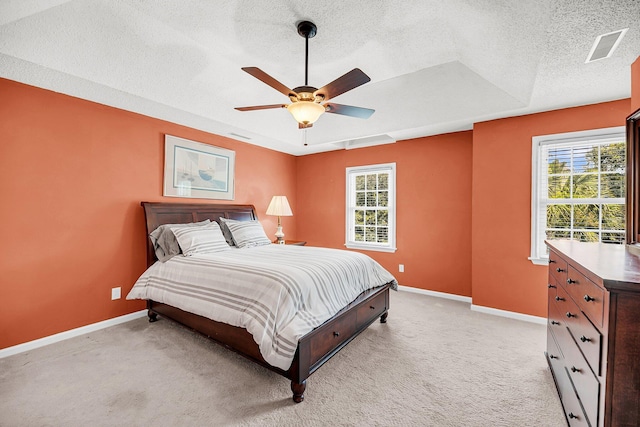 721 Lake Frances Dr, Charleston, SC 29412 - bedroom with multiple windows, light carpet, a textured ceiling, and ceiling fan