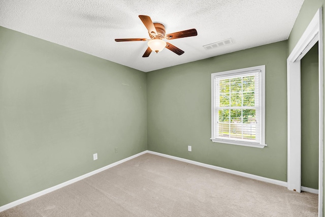 721 Lake Frances Dr, Charleston, SC 29412 - carpeted empty room with a ceiling fan and a textured ceiling
