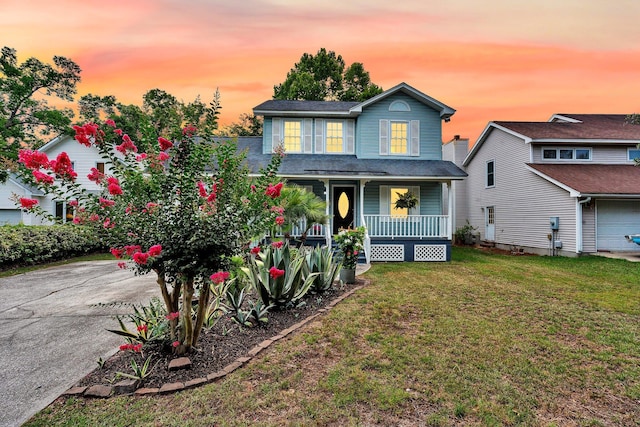 721 Lake Frances Dr, Charleston, SC 29412 - traditional-style house with a porch and a lawn