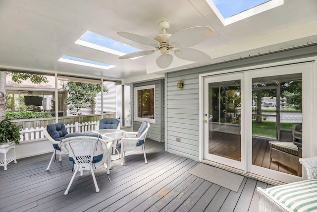 721 Lake Frances Dr, Charleston, SC 29412 - sunroom / solarium with a skylight, outdoor dining area, ceiling fan, and healthy amount of natural light