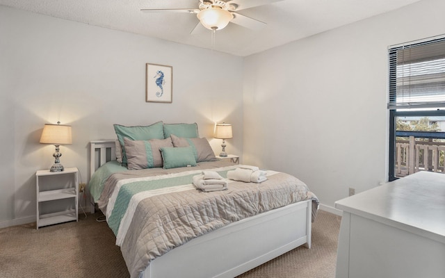 bedroom with ceiling fan and carpet