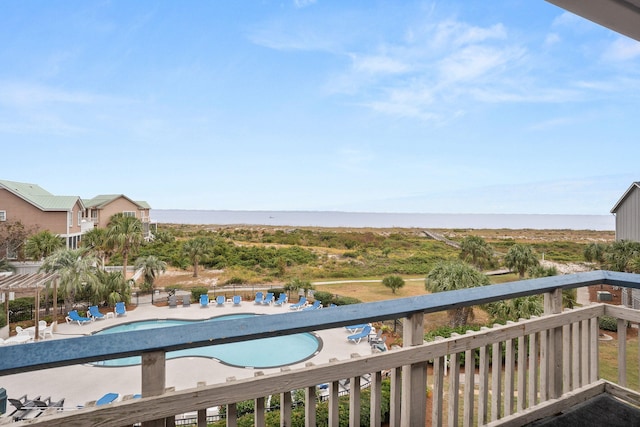 view of swimming pool with a patio area