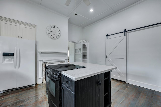 kitchen featuring a kitchen island, black range with electric stovetop, white fridge with ice dispenser, a ceiling fan, and dark cabinets