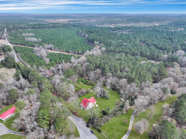 aerial view with a wooded view