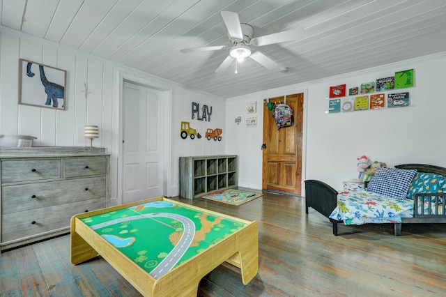 rec room with wood finished floors and ceiling fan