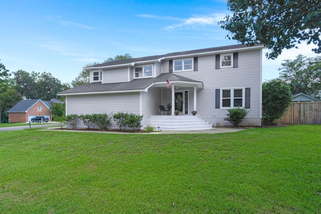 view of front of home featuring a front lawn