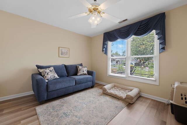 9091 Delancey Cir N, Charleston, SC 29406 - living room featuring wood finished floors and a ceiling fan