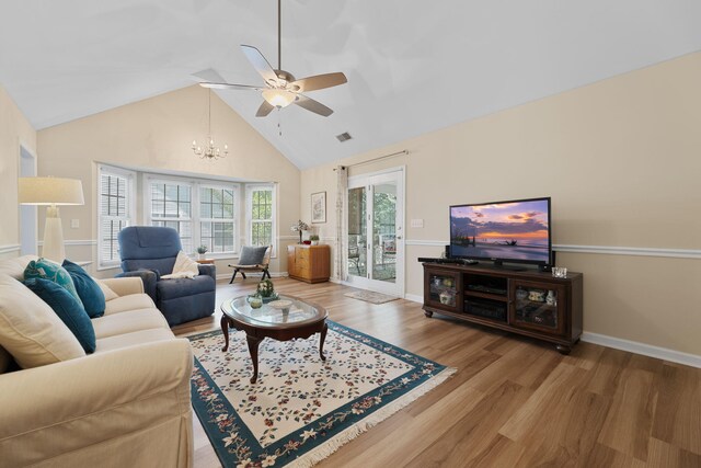 9091 Delancey Cir N, Charleston, SC 29406 - living area featuring wood finished floors, ceiling fan, a chandelier, and high vaulted ceiling