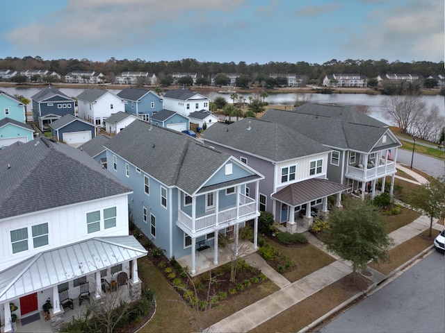 drone / aerial view with a water view