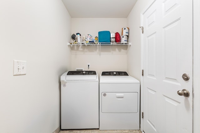 laundry room with laundry area and washing machine and dryer
