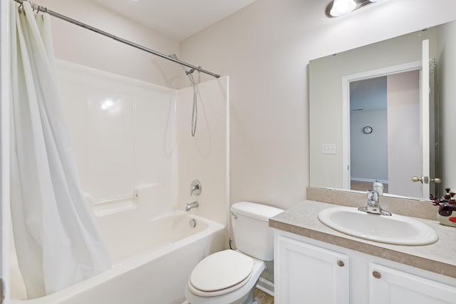 full bathroom featuring vanity, toilet, and shower / bath combo with shower curtain