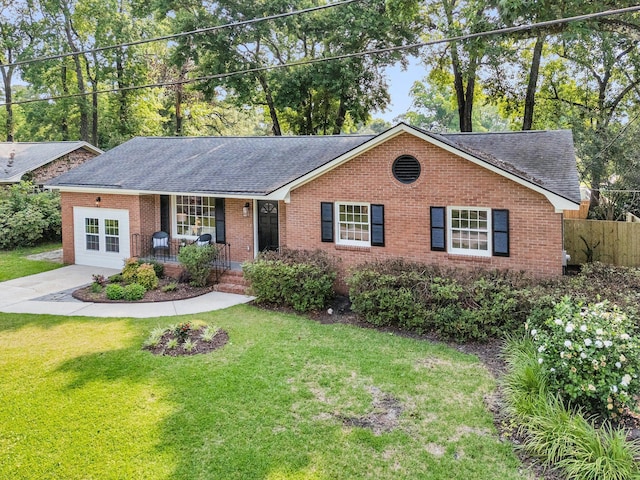 1391 Fairfield Ave, Charleston, SC 29407 - single story home with covered porch, a shingled roof, brick siding, and concrete driveway