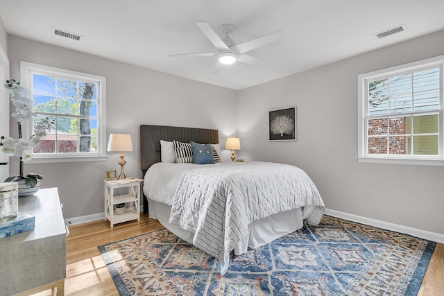1391 Fairfield Ave, Charleston, SC 29407 - bedroom with wood finished floors, baseboards, and a ceiling fan