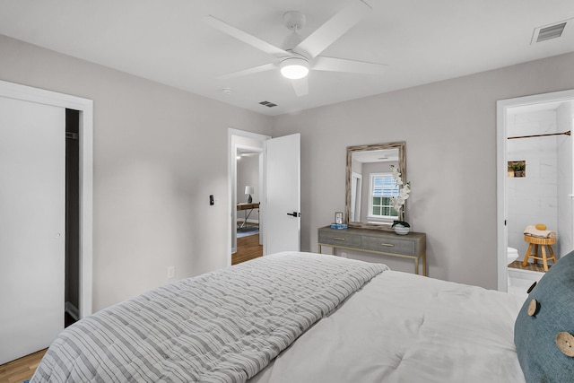 1391 Fairfield Ave, Charleston, SC 29407 - bedroom with wood finished floors, ensuite bath, and ceiling fan
