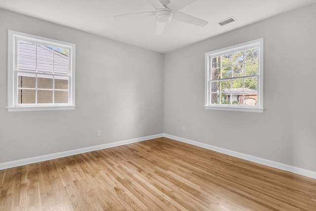 1391 Fairfield Ave, Charleston, SC 29407 - unfurnished room with baseboards, light wood-style floors, and ceiling fan