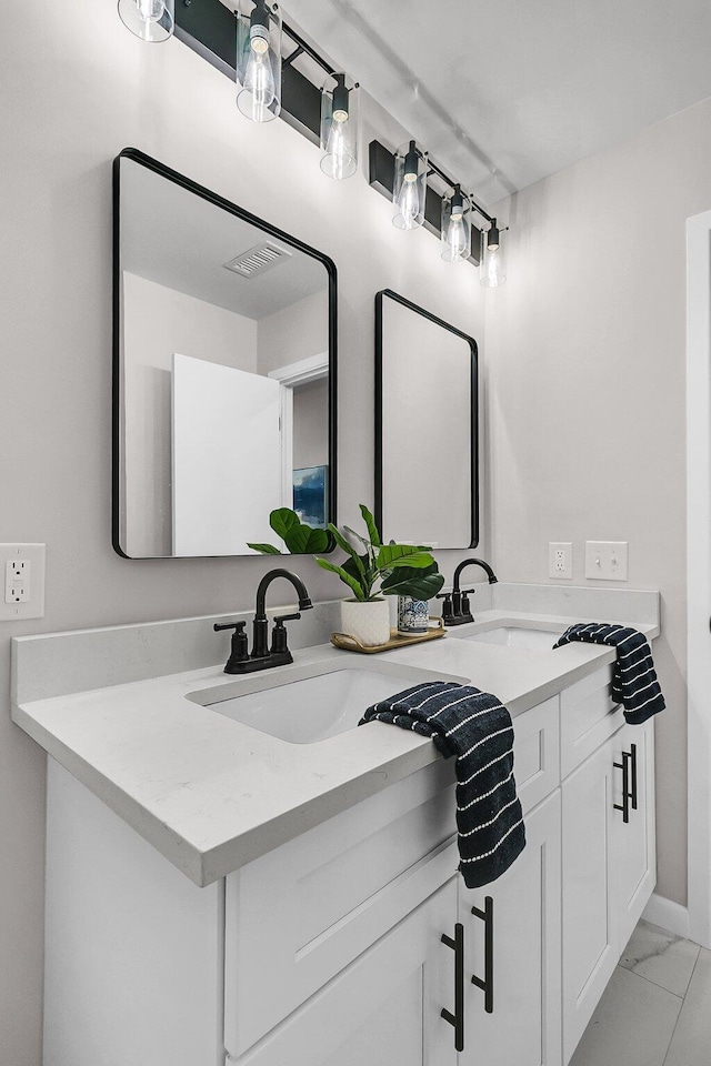 1391 Fairfield Ave, Charleston, SC 29407 - bathroom with double vanity and marble finish floors