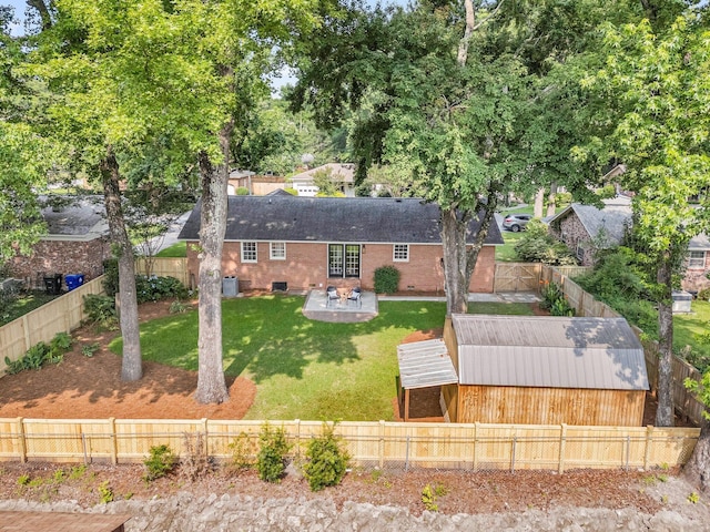 1391 Fairfield Ave, Charleston, SC 29407 - back of house with a patio, brick siding, a shingled roof, and central AC