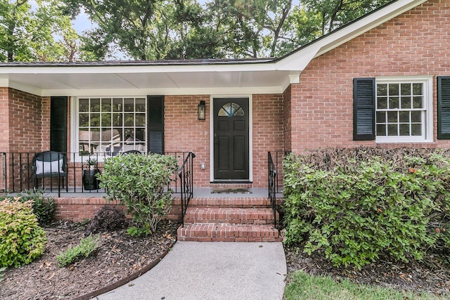 1391 Fairfield Ave, Charleston, SC 29407 - doorway to property featuring covered porch and brick siding