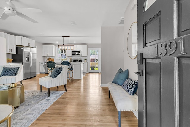 1391 Fairfield Ave, Charleston, SC 29407 - living area with light wood-type flooring, ceiling fan, baseboards, and recessed lighting