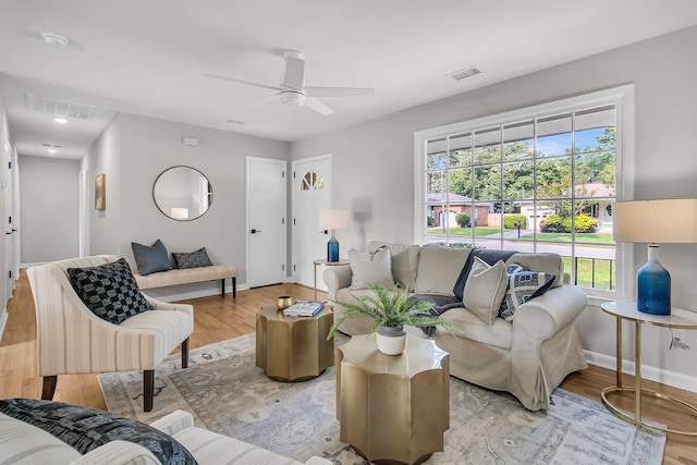 1391 Fairfield Ave, Charleston, SC 29407 - living room featuring baseboards, wood finished floors, and ceiling fan