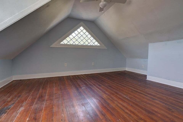 bonus room with ceiling fan, vaulted ceiling, and dark hardwood / wood-style floors